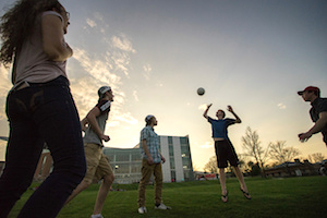 students playing volleyball